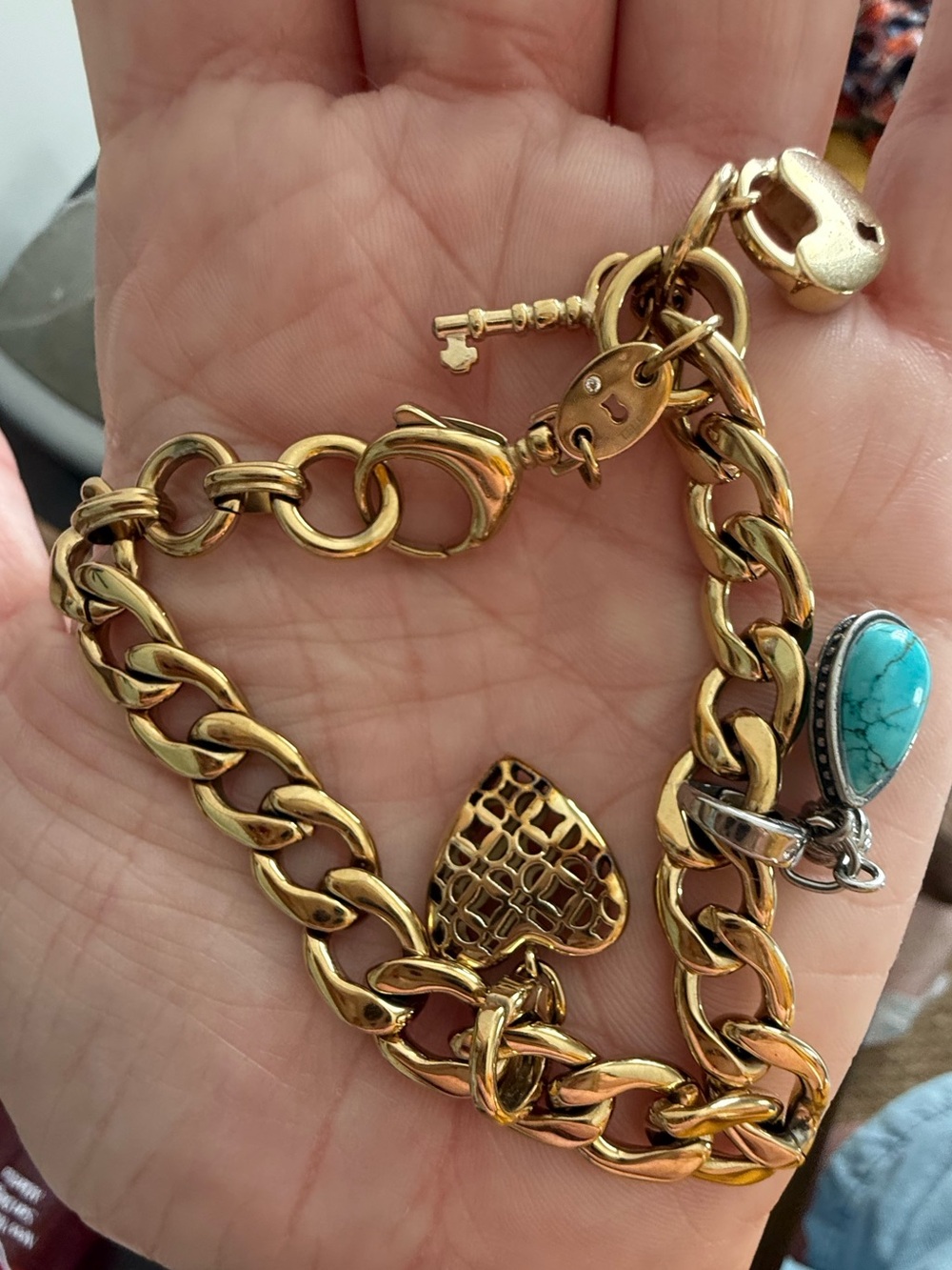 Gold Tone Fossil Charm Bracelet with two charms